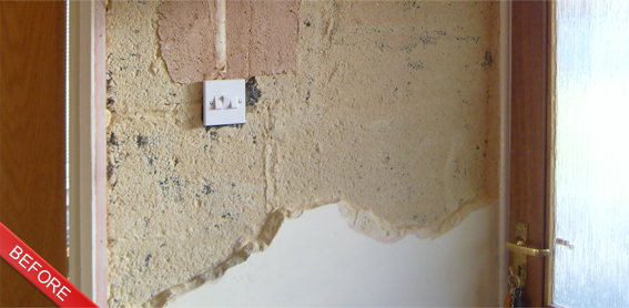 Before plastering - damaged wall with exposed plaster